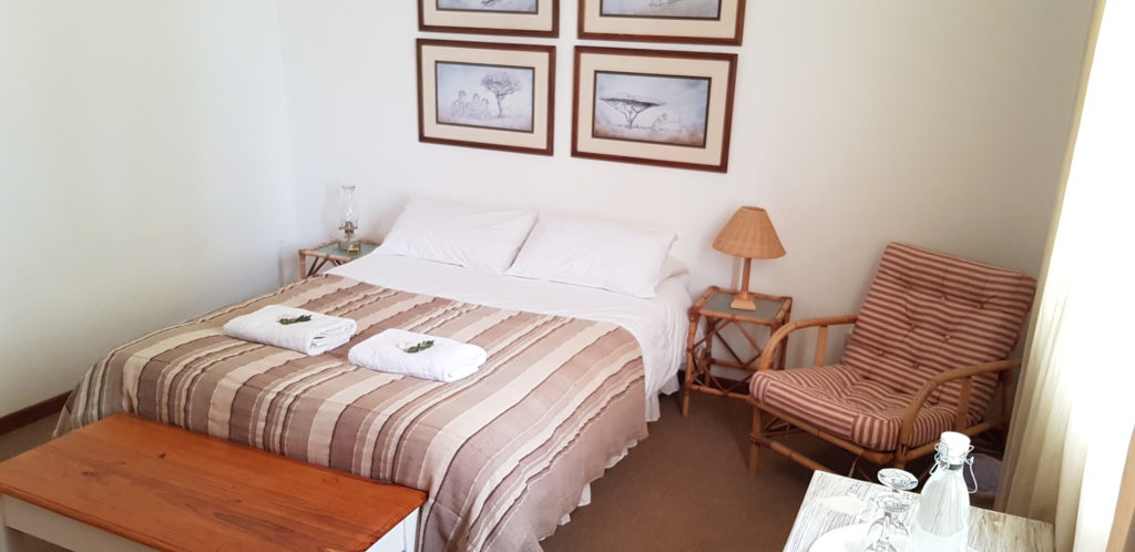 ROOM 5 HAS ONE DOUBLE BED AND SHARES A BATHROOM WITH ROOM 4. PRIVATE USE OF THE BATHROOM IS AVAILABLE AT AN EXTRA R50 PER NIGHT.